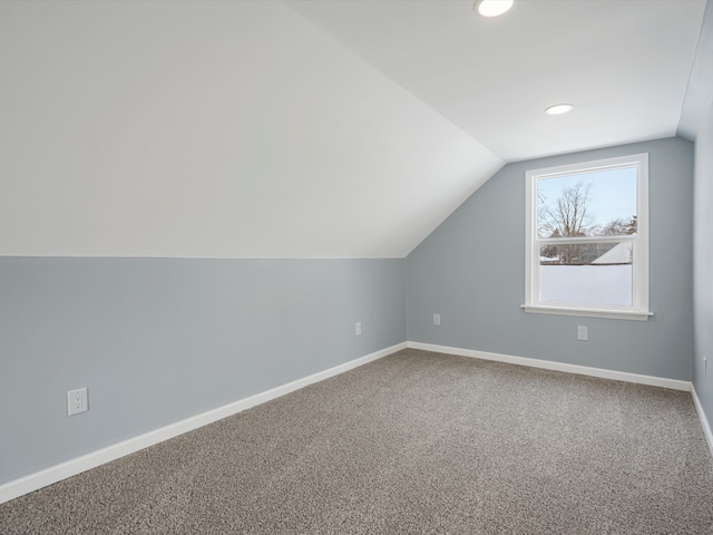 bonus room featuring carpet floors, lofted ceiling, baseboards, and recessed lighting