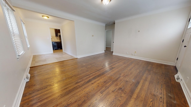 unfurnished room featuring wood-type flooring