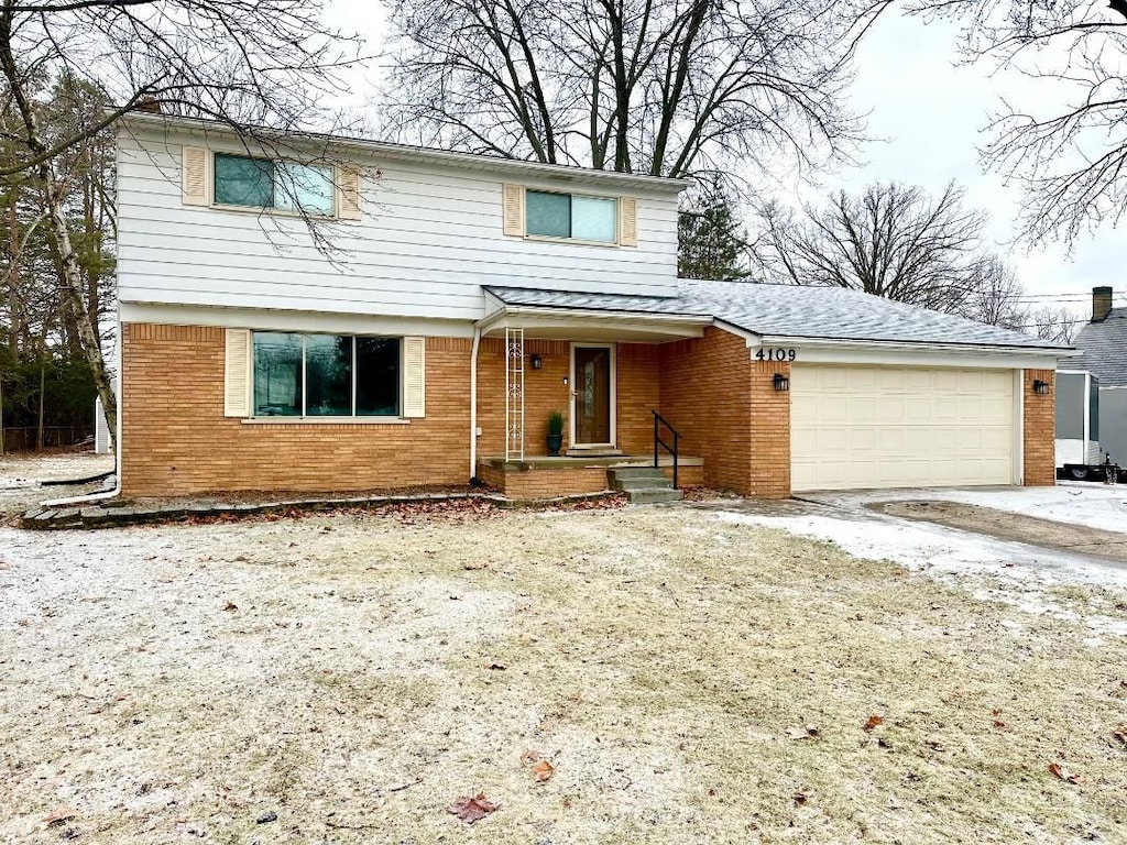 front of property featuring a garage