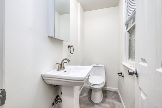 bathroom featuring toilet