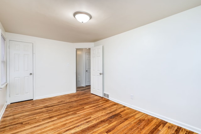 unfurnished bedroom with light hardwood / wood-style floors