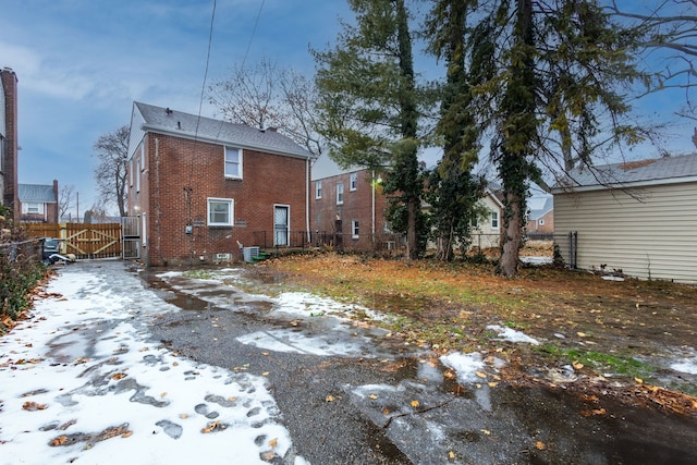 view of snow covered property