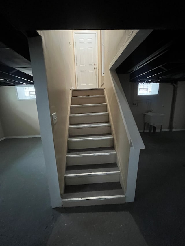 staircase featuring sink