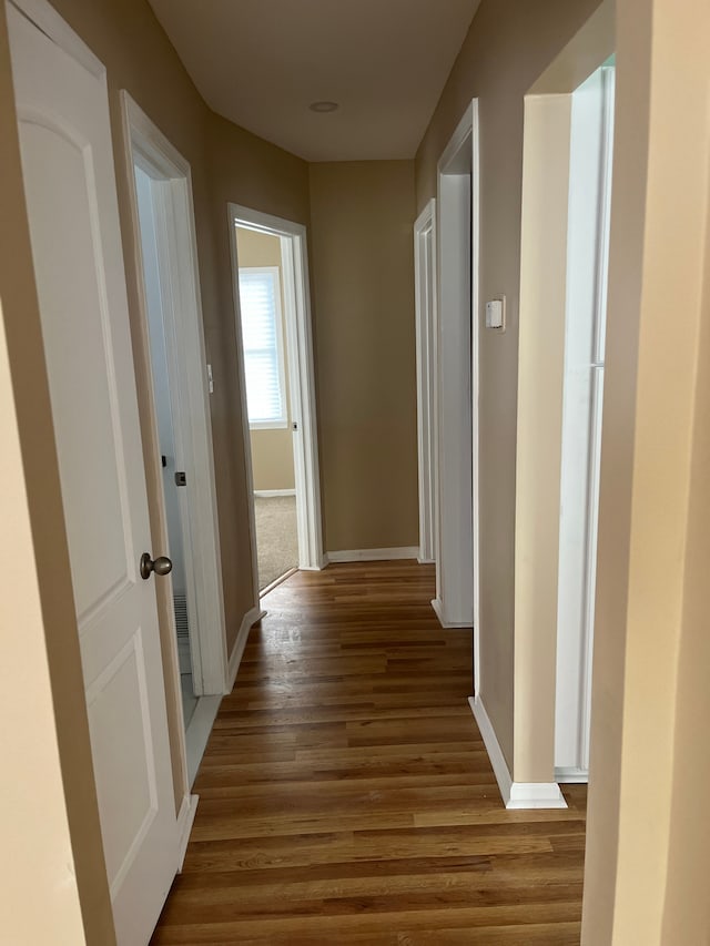 hall with light hardwood / wood-style flooring