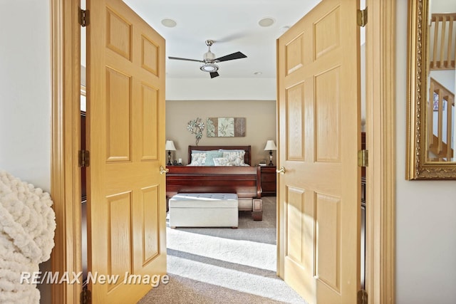 hall with carpet floors