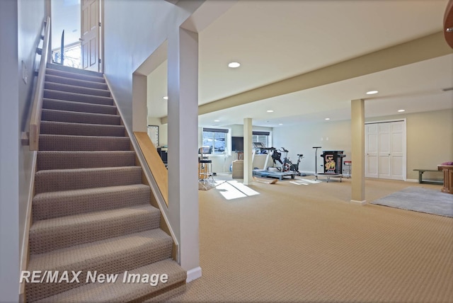 stairs with carpet flooring