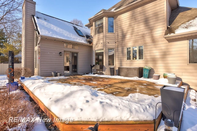 view of snow covered property