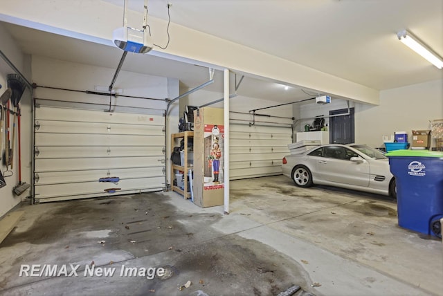 garage featuring a garage door opener