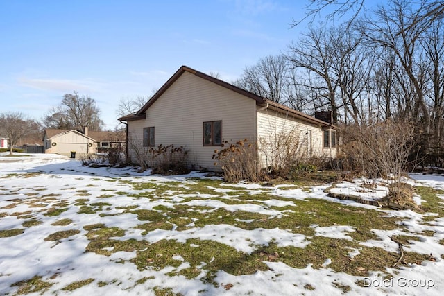 view of snow covered property