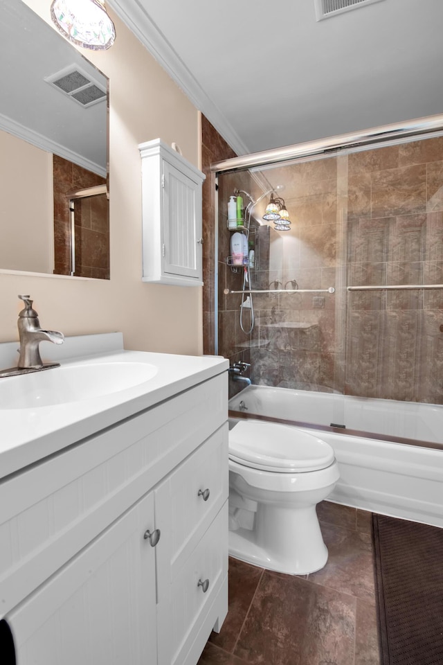 full bathroom with crown molding, enclosed tub / shower combo, vanity, and toilet