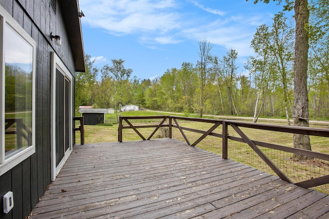 deck featuring a yard