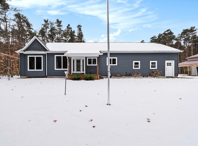 view of snow covered property