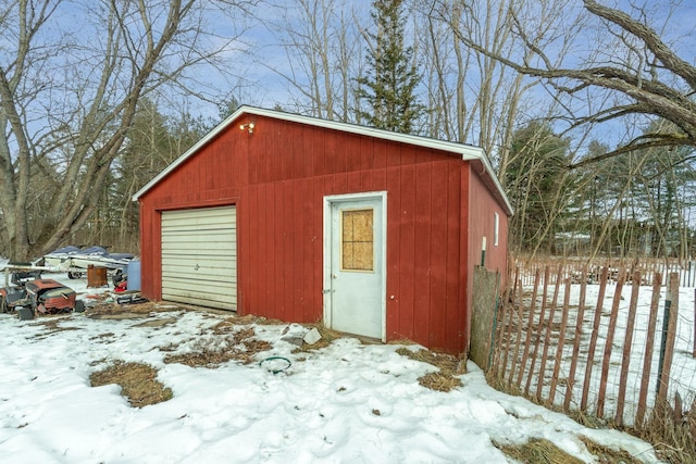 view of snow covered garage