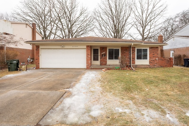 view of front of property with a garage and a front lawn