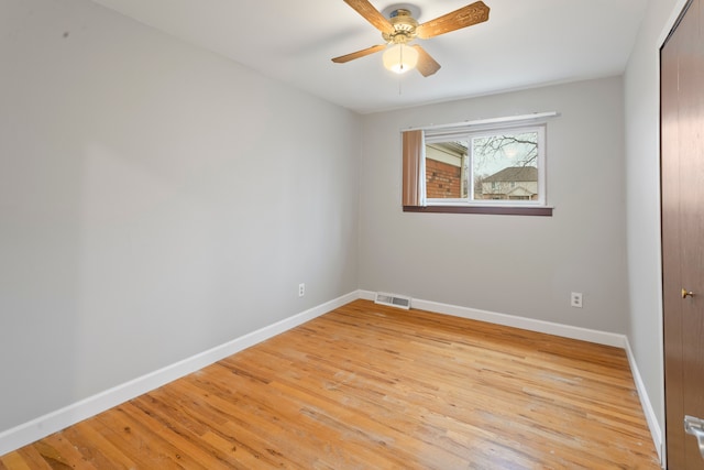 unfurnished room with ceiling fan and light hardwood / wood-style floors