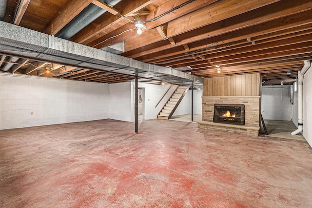 basement with a fireplace