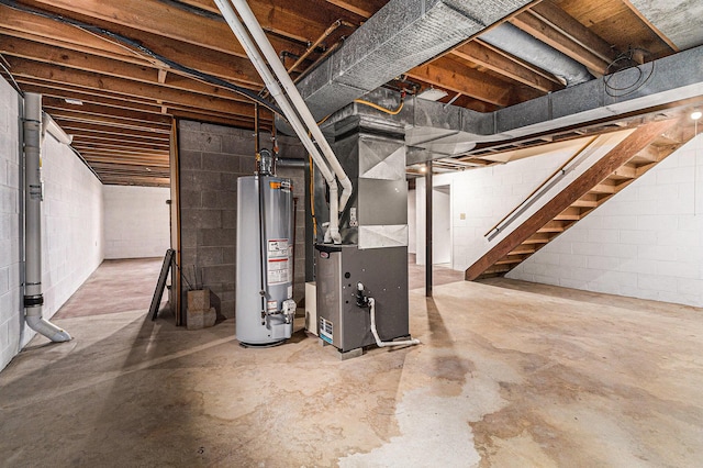 basement with water heater and heating unit