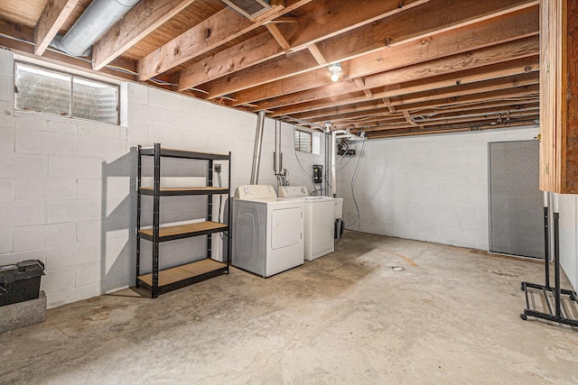 basement with plenty of natural light and washer and clothes dryer