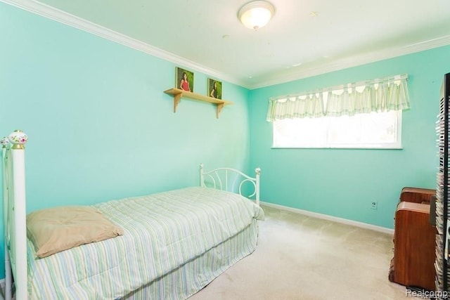 carpeted bedroom featuring ornamental molding