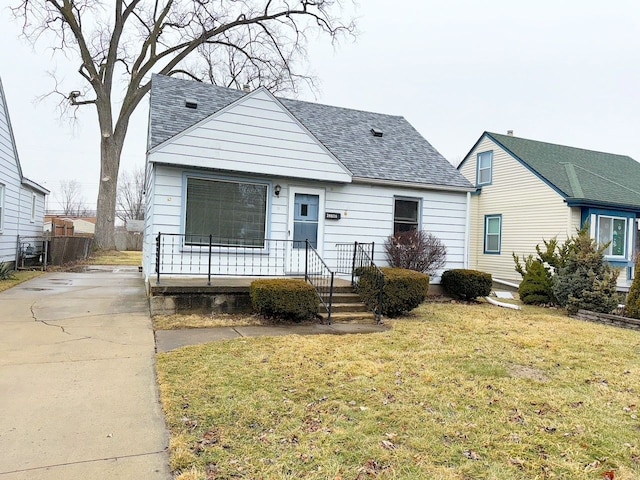 view of front of home with a front lawn