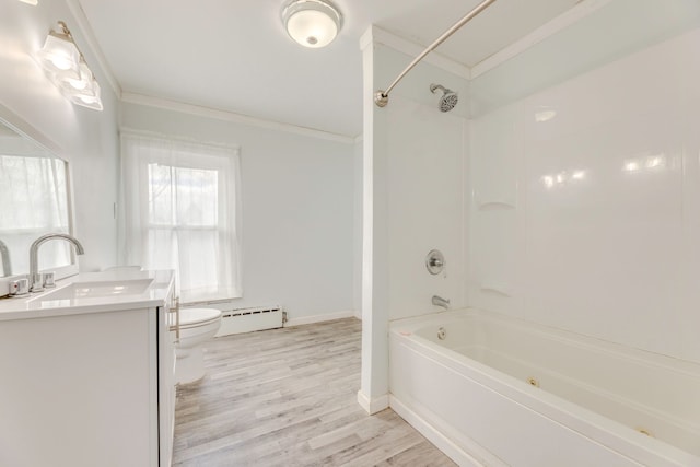 full bathroom featuring bathing tub / shower combination, wood-type flooring, vanity, a baseboard heating unit, and crown molding