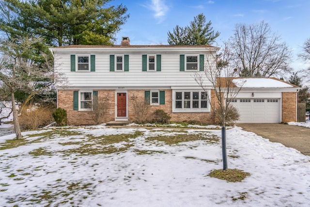 front of property with a garage