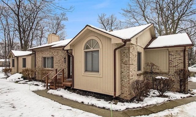 view of snow covered property