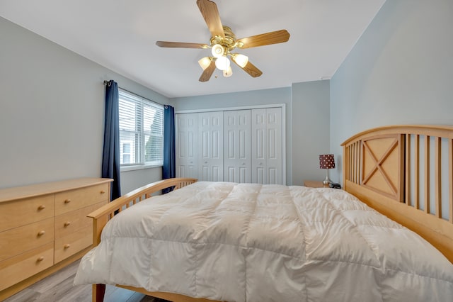 1611 Harwood Dr, Oxford, MI 48371 - bedroom with light wood-style flooring, a closet, and a ceiling fan