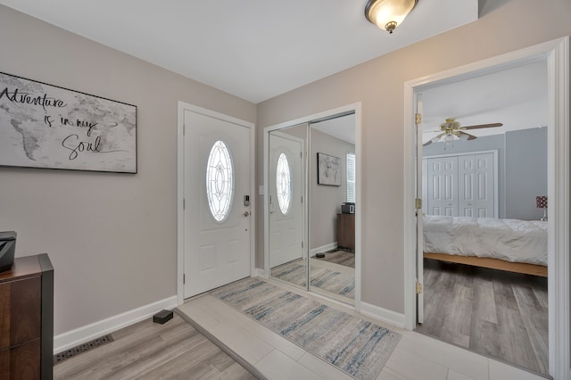 1611 Harwood Dr, Oxford, MI 48371 - entrance foyer with a ceiling fan and light wood finished floors