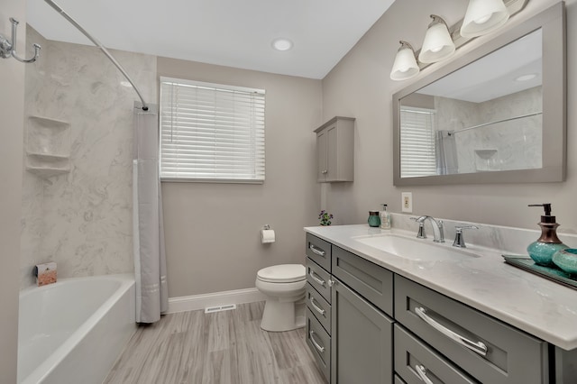 1611 Harwood Dr, Oxford, MI 48371 - full bathroom featuring vanity, shower / tub combo, and wood finished floors