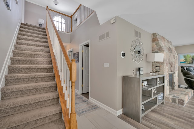 1611 Harwood Dr, Oxford, MI 48371 - stairs with healthy amount of natural light and a high ceiling