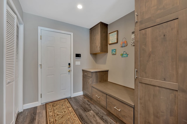 1611 Harwood Dr, Oxford, MI 48371 - mudroom featuring dark wood finished floors and baseboards