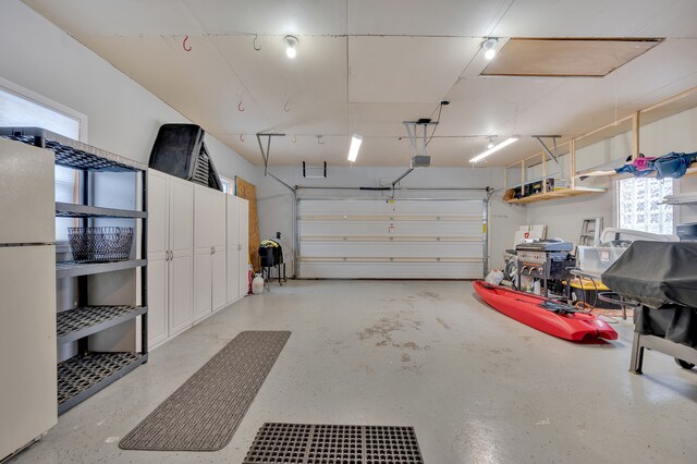 1611 Harwood Dr, Oxford, MI 48371 - garage featuring freestanding refrigerator