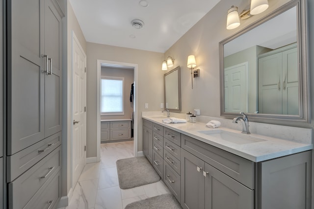 1611 Harwood Dr, Oxford, MI 48371 - full bath with marble look tiles and double vanity