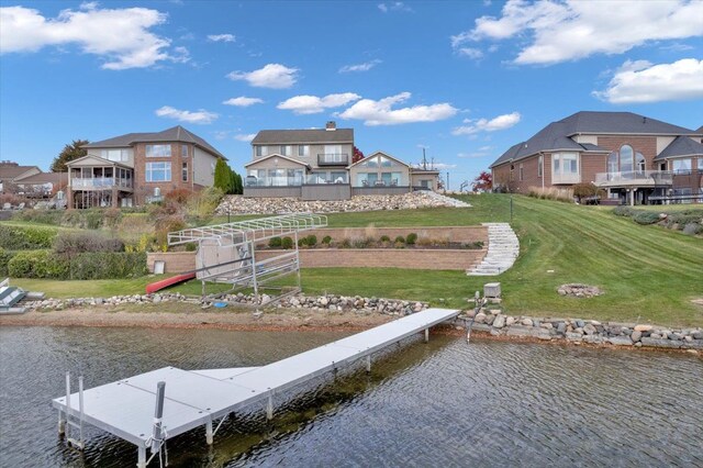 1611 Harwood Dr, Oxford, MI 48371 - dock area with a water view and a lawn