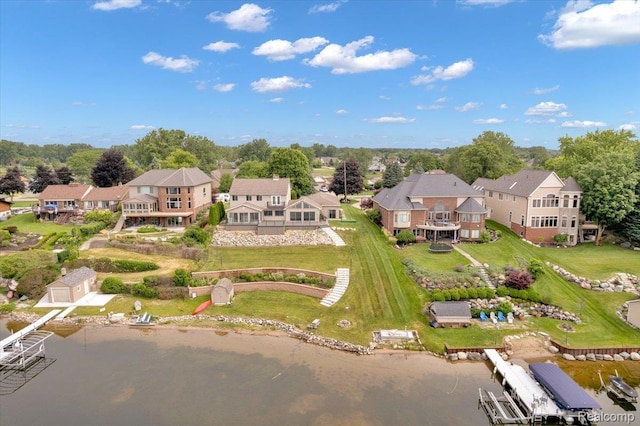 1611 Harwood Dr, Oxford, MI 48371 - aerial perspective of suburban area with a nearby body of water and a tree filled landscape