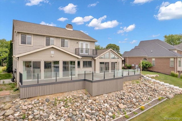 1611 Harwood Dr, Oxford, MI 48371 - back of house with a balcony and a chimney