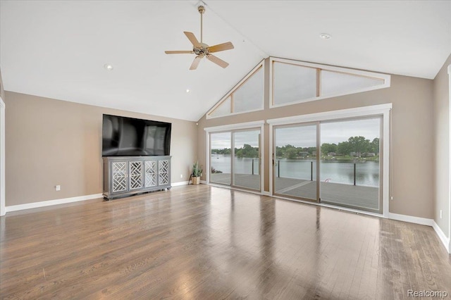 1611 Harwood Dr, Oxford, MI 48371 - unfurnished living room with a ceiling fan, high vaulted ceiling, wood finished floors, and recessed lighting