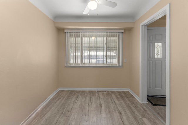 entrance foyer with light hardwood / wood-style floors and ceiling fan