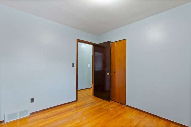 empty room featuring light hardwood / wood-style floors