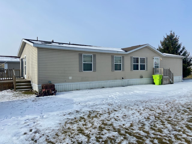 view of snow covered house