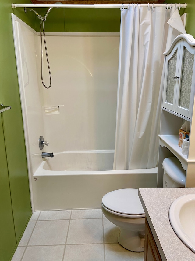 full bathroom featuring tile patterned flooring, vanity, shower / tub combo, and toilet