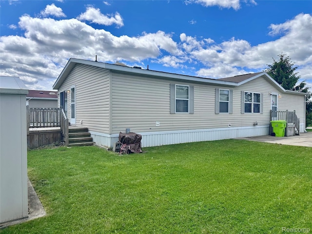 52263 Landsdowne Cir, Chesterfield, MI 48051 - view of side of property with a yard