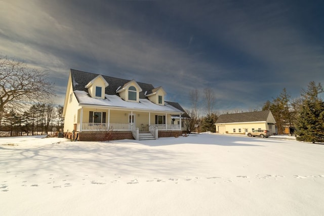 view of front facade with a garage and a porch