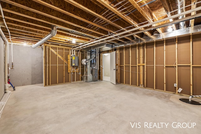 unfinished basement with electric panel and heating unit