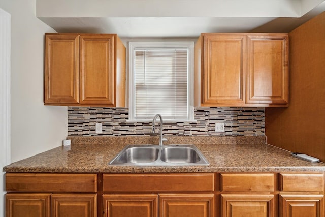 kitchen with sink and backsplash