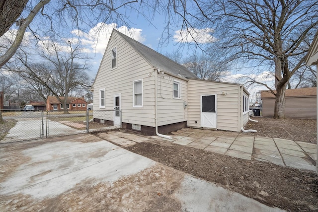 rear view of property with a patio