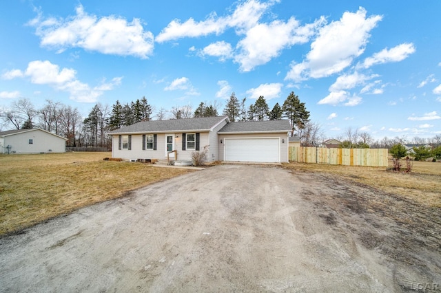 ranch-style home with a garage and a front lawn