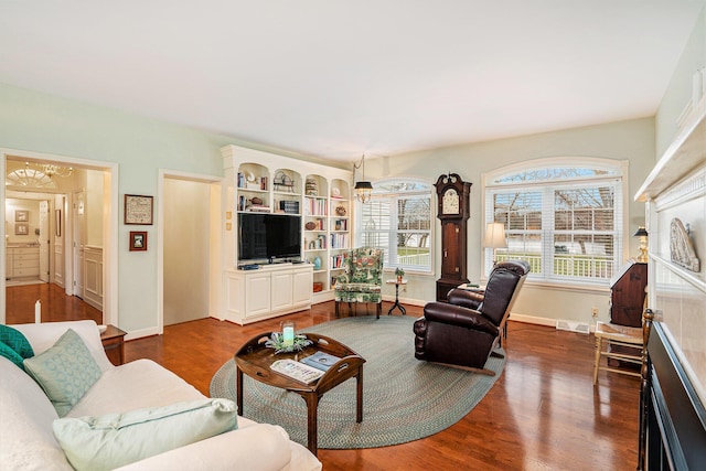 living room featuring dark hardwood / wood-style floors