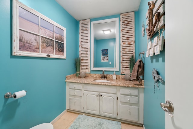 bathroom with vanity and tile patterned flooring